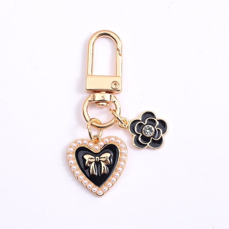 Cute bear and heart accessory, a lovely keychain with a tiny bell charm for any bag.