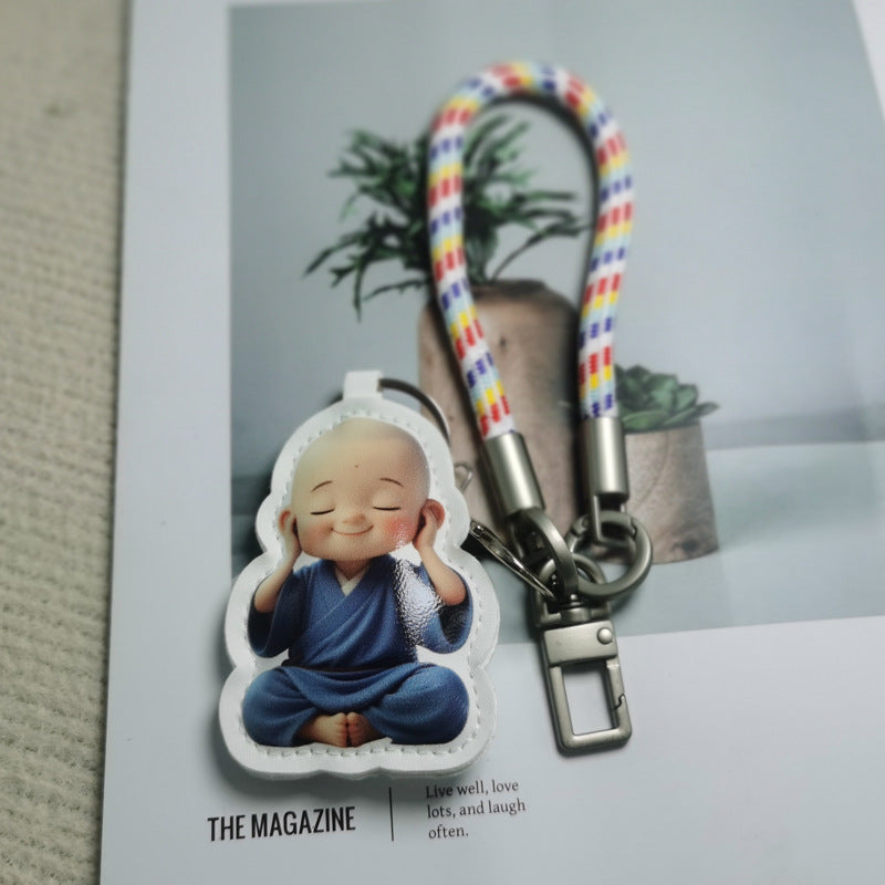 Vibrant pink cartoon character keychain, charming & durable accessory for bags or keys.