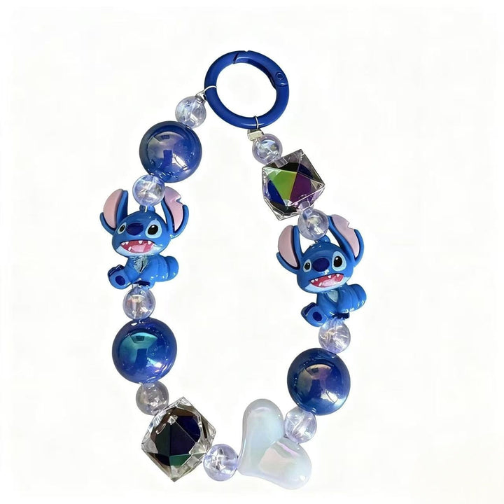 Assorted cute cartoon character keychains, plastic bag charms & keyring accessories.
