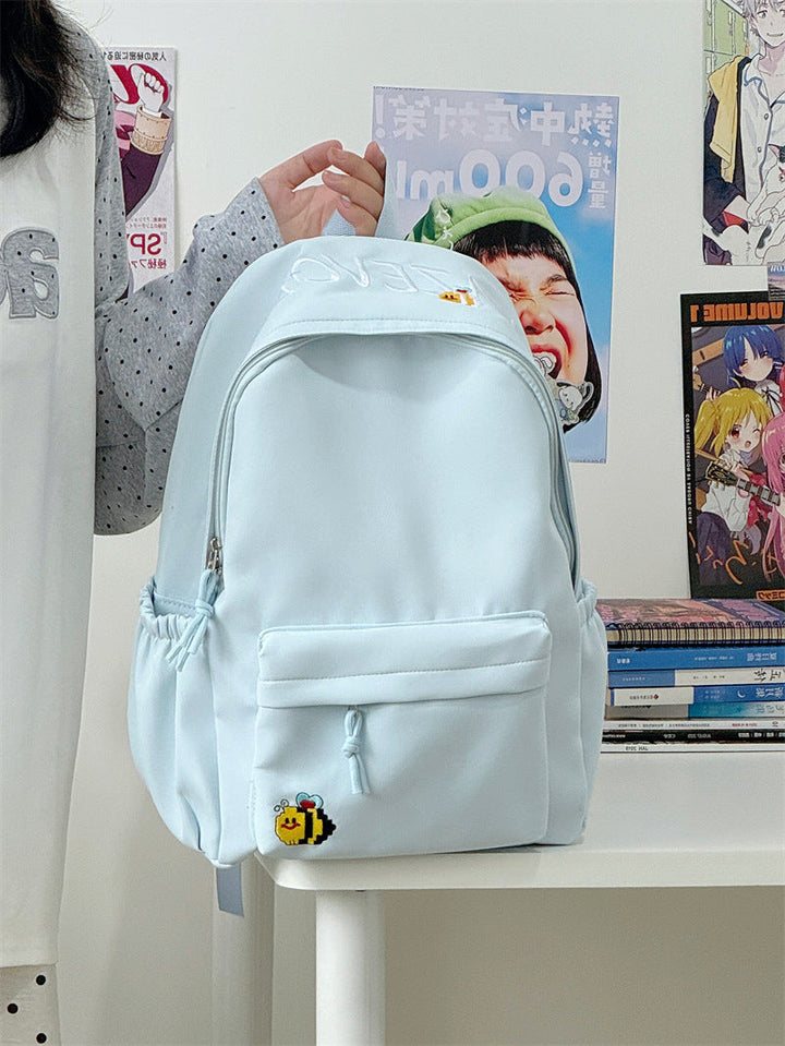 Cute cartoon-inspired school backpack for kids, unisex design, playful style, vibrant colors, perfect for school.
