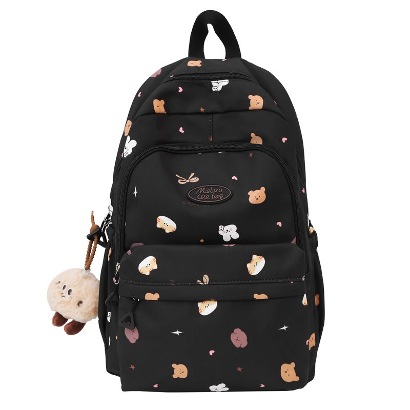 Stylish girls' cute cartoon school backpack, featuring durable material & vibrant design, for daily school.