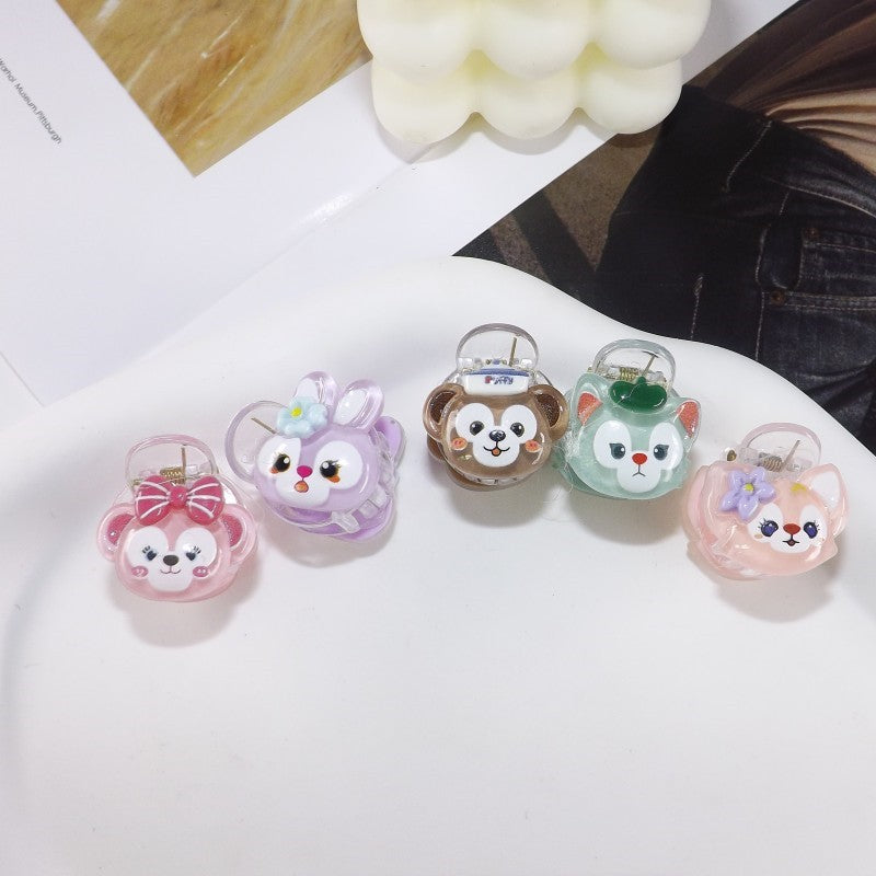 Women's playful cat hair clip with charming animal design. Cute and stylish hair accessory.