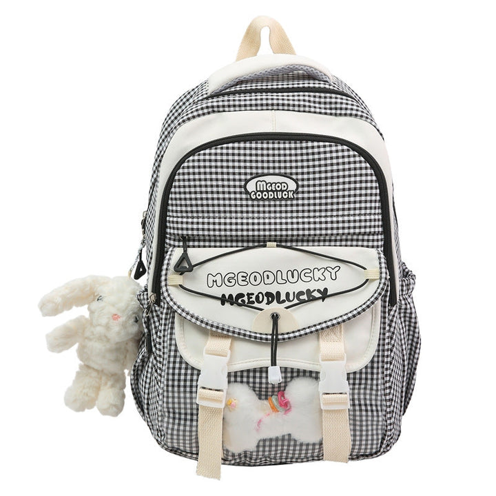 Unisex cute character backpack in black. Versatile for school, daily use, or travel. Durable & lightweight design.