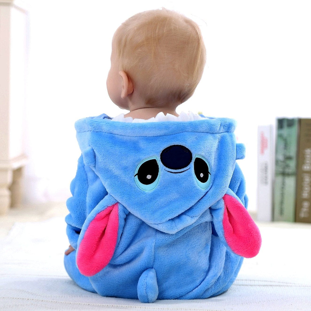 Cheerful animal pajama sleepsuit for children. Cozy kids sleepwear in various characters: unicorn, panda, cow, Stitch.