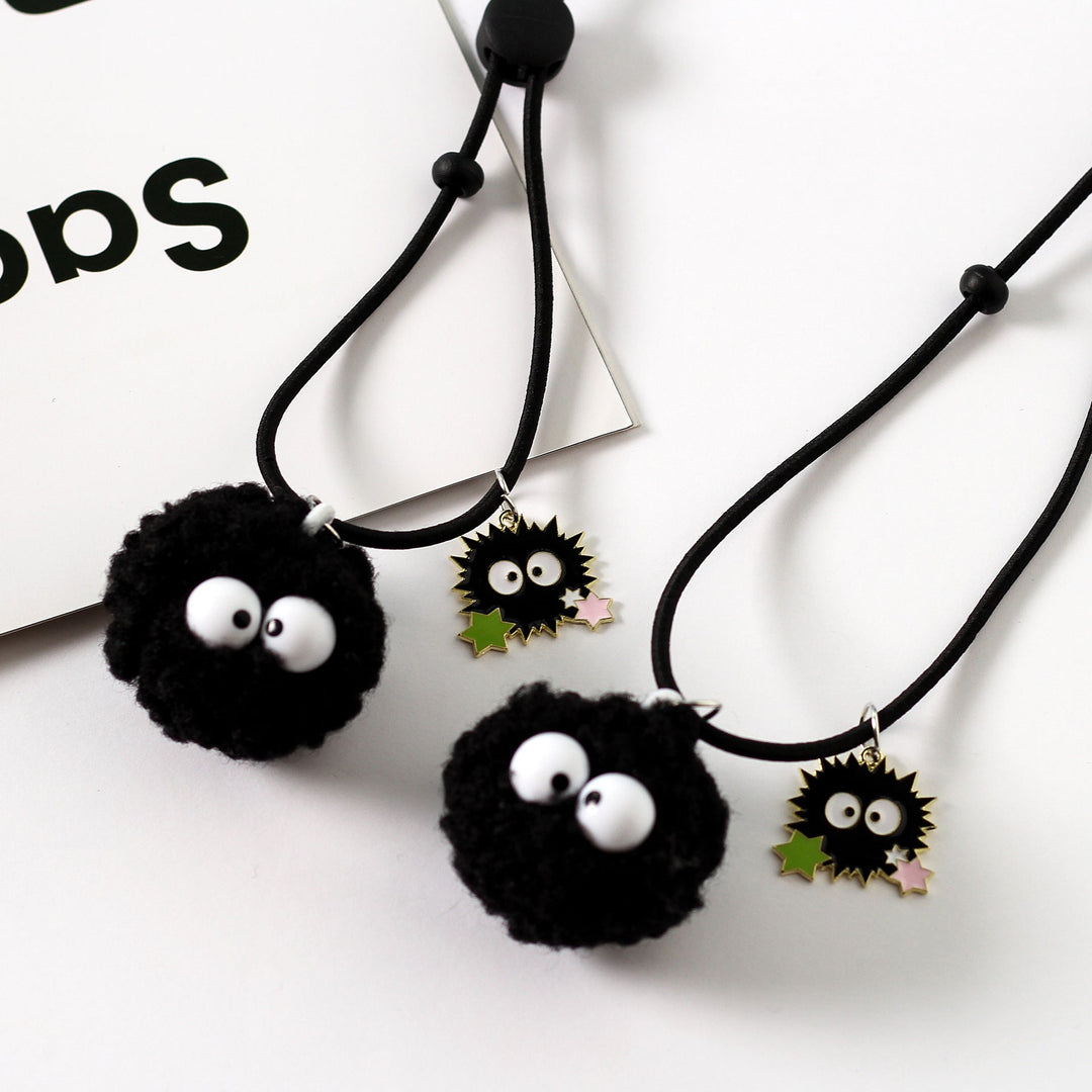 Unique plush character keychain with big embroidered eyes. Fun unisex bag accessory & playful gift.