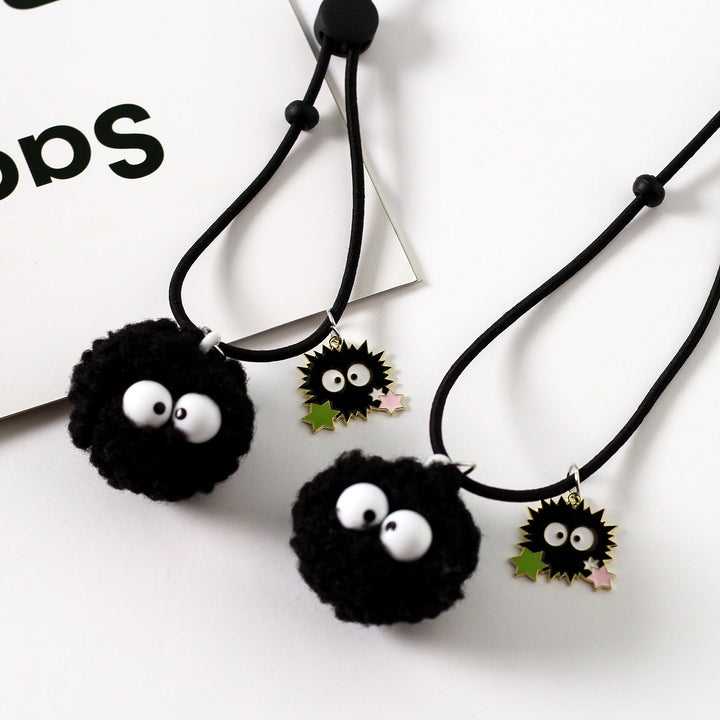 Unique plush character keychain with big embroidered eyes. Fun unisex bag accessory & playful gift.