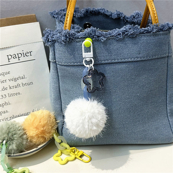 Playful fuzzy pom-pom keychain. Women's colorful bag charm accessory.