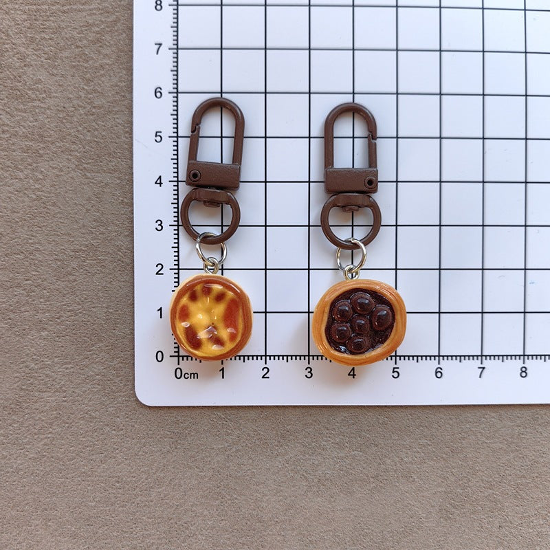 Charming cake design keychain for keys & bags. A sweet, cute accessory to personalize your everyday carry.