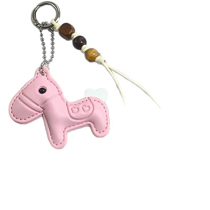 Whimsical white bear key holder in synthetic leather, a cute animal gift and practical bag charm.