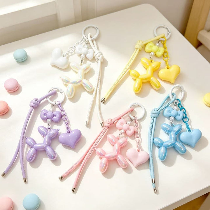 Unisex heart and balloon dog charm keychain, a cute and colorful gift accessory.