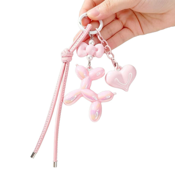 Trendy resin balloon dog and heart charm, a stylish keychain accessory.