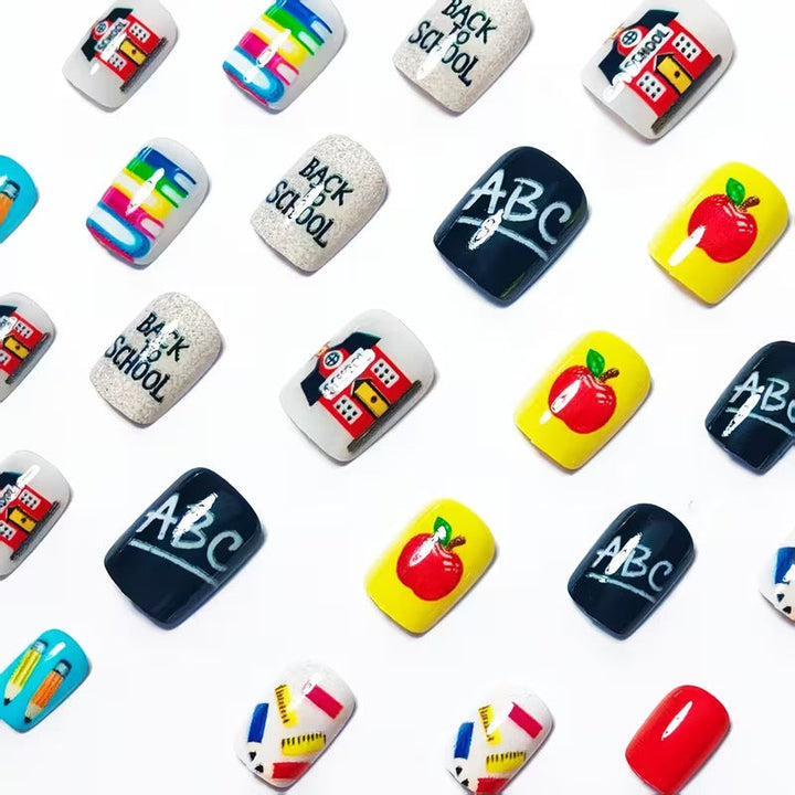 Vibrant school-themed press-on nail art set for women, depicting student life. Quick & easy false nail application.