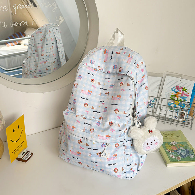 Cute unisex brown cartoon cat school backpack for kids. Playful travel bag with spacious design for students.