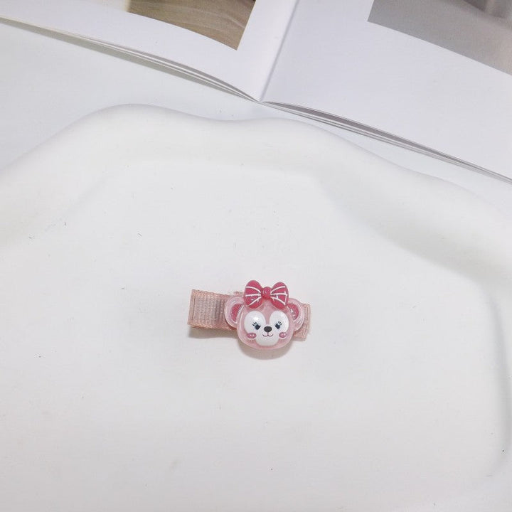 White bunny hair clip with perky ears, a cute and playful women's accessory.