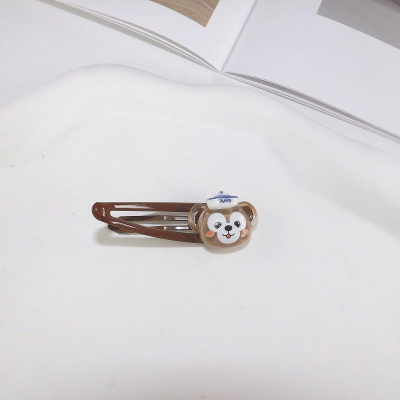 Women's hair styled with a cute white bunny clip, playful fashion accessory.