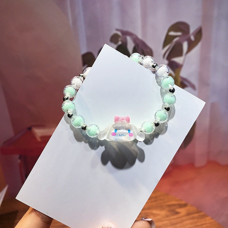 Cute women's animal charm bracelet, plastic, playful style jewelry accessory.