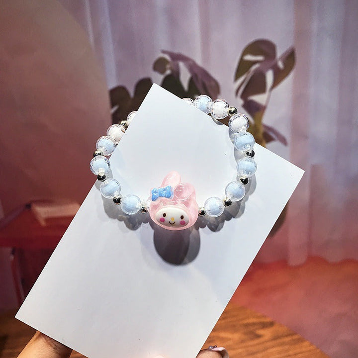 Women's playful animal charm bracelet, cute plastic accessory for everyday fun.
