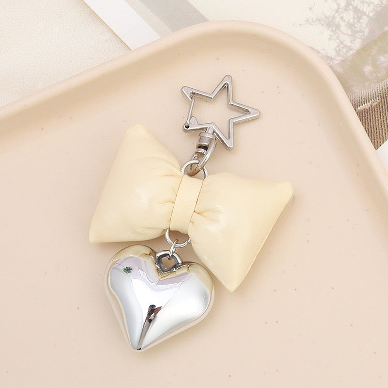 Vibrant cute bow & heart keychain. Stylish bag accessory & key holder for women's purses.