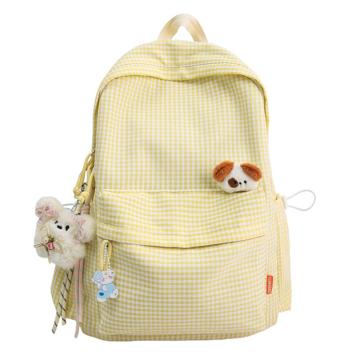 Cute women's checked pattern backpack, ideal for daily use, school, or travel. A stylish fashion accessory.