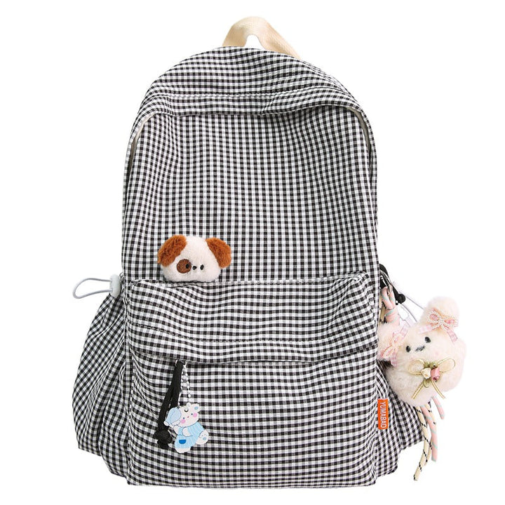 Stylish women's checked backpack, versatile for travel, work, or daily use. Features a cute design.