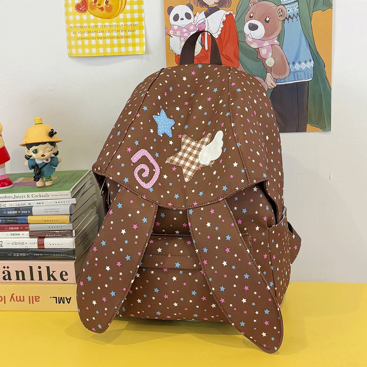 Cute women's pink bunny ear backpack for school & travel. Playful design, perfect for students.
