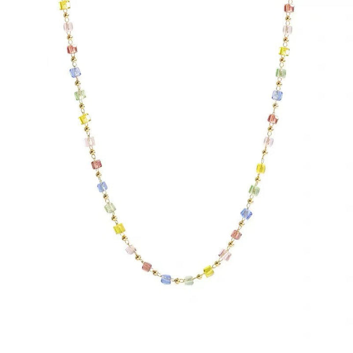 Versatile dainty beaded necklace with colorful beads, perfect for layering or solo wear.