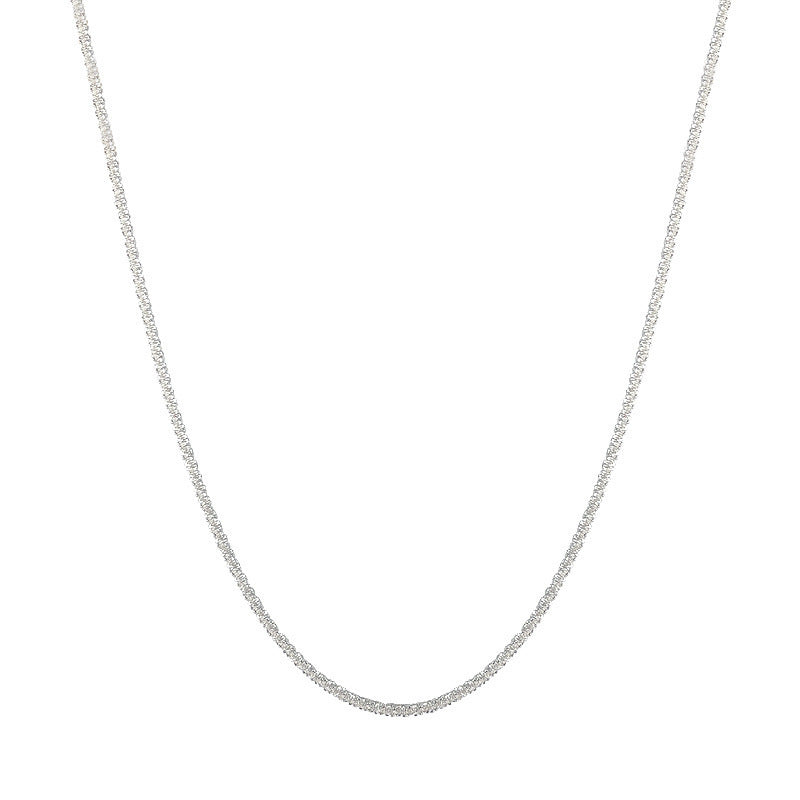 Dainty gold-tone textured chain bracelet. Elegant minimalist jewelry for women's daily wear or special occasions.