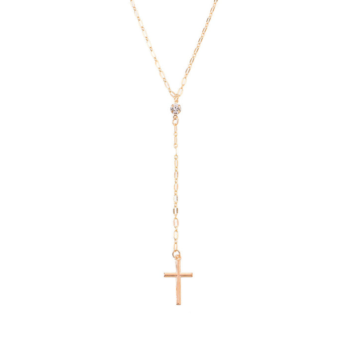 Fashionable women's cross lariat necklace, delicate and dainty spiritual jewelry for everyday wear.