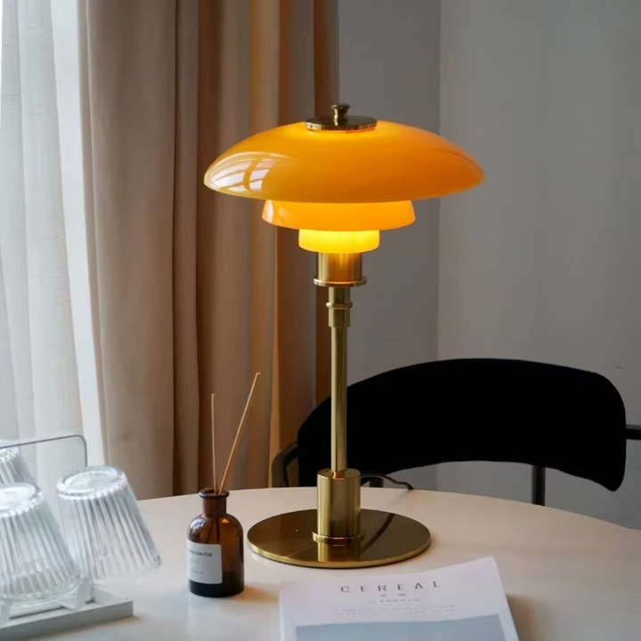 Danish designer LED table lamp, warm dimmable light for modern living rooms & bedrooms.