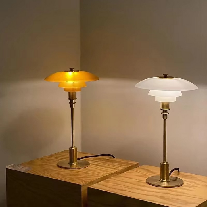 Dimmable warm LED Danish design table lamp, enhancing any room with modern style.