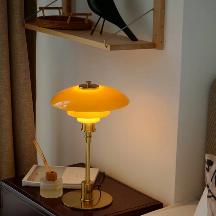 Sleek iron & glass Danish table lamp, a modern LED lighting solution with warm glow.