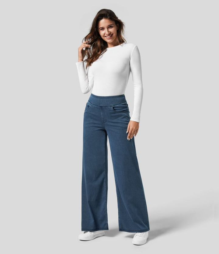 Women's high-waisted dark blue wide-leg trousers, ideal stretch pants for autumn fashion.