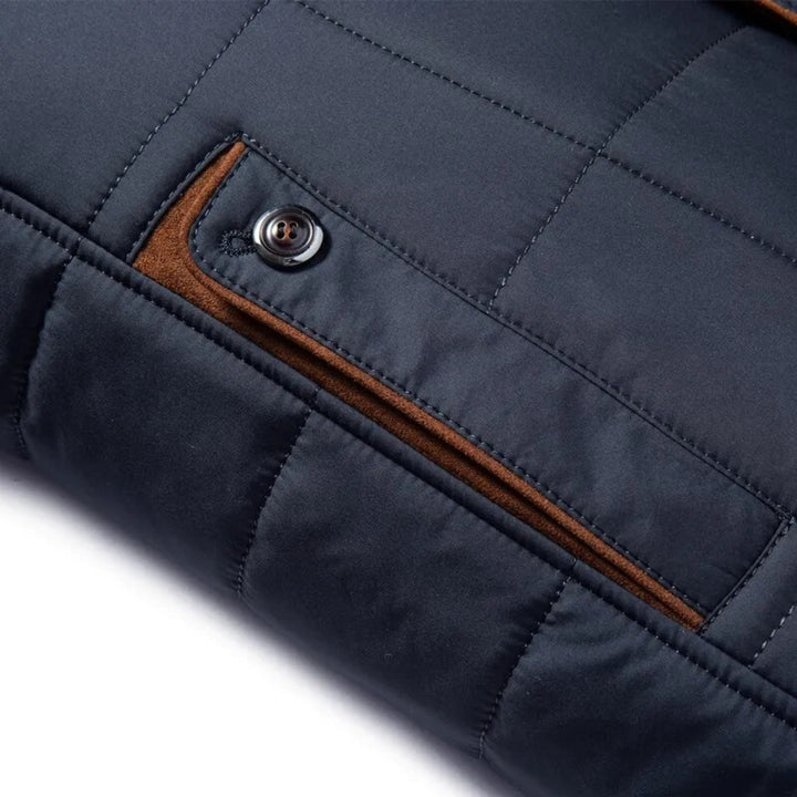 Red men's warm quilted winter jacket with stand collar. A stylish, casual outerwear for cold weather fashion.
