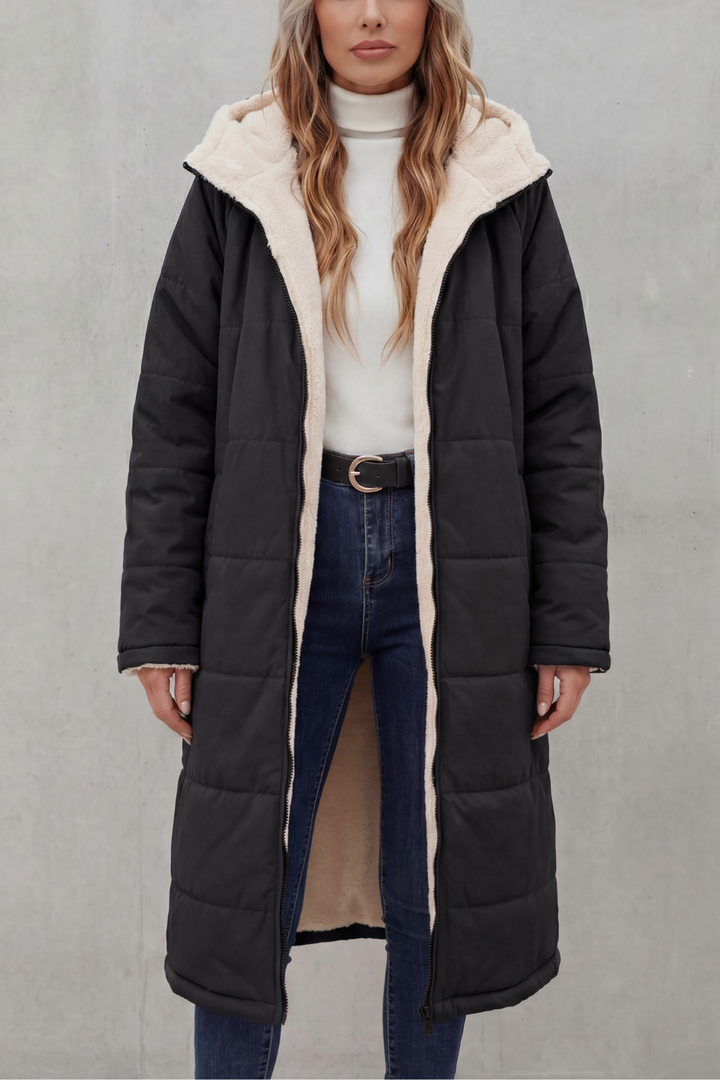 Soft dark blue plush women's coat. A warm winter essential for everyday comfort & style.