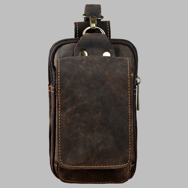 Stylish men's leather waist bag in dark brown, a versatile fanny pack for travel essentials.