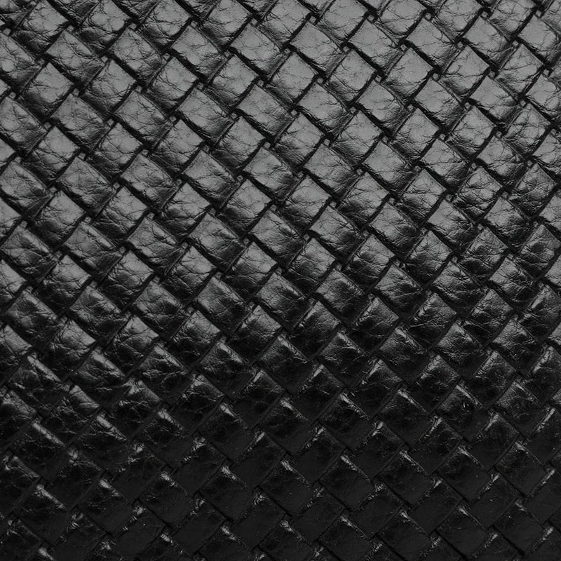 Versatile men's leather shoulder bag, shown at an angle, ideal for travel & daily use.