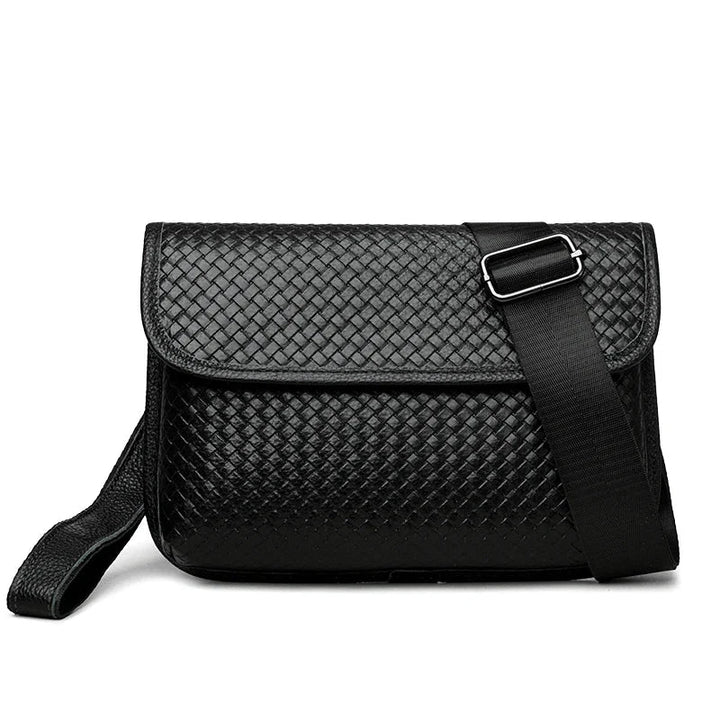 Multiple external pockets on an organized men's leather crossbody sling bag.