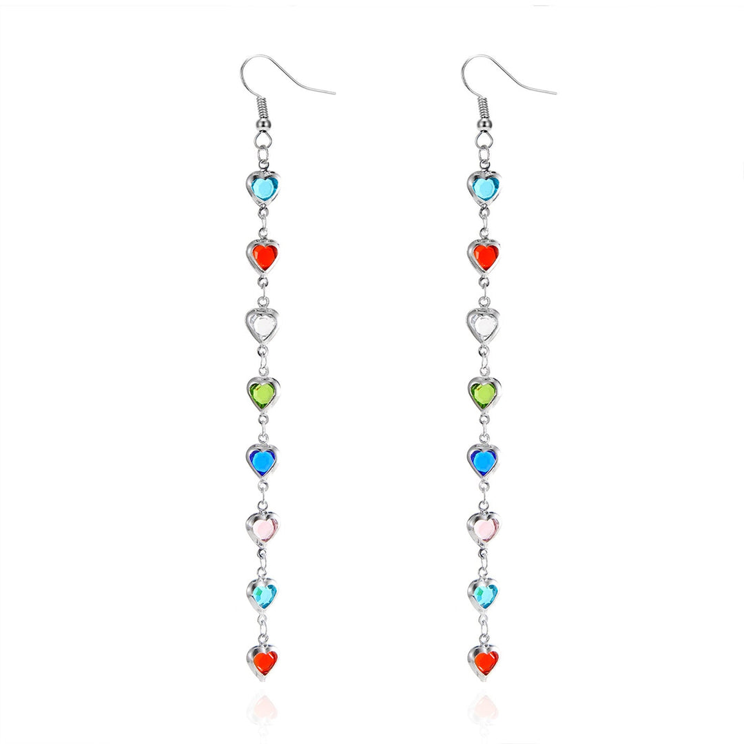 Pair of women's heart-shaped statement earrings. Dazzling white drop fashion jewelry, elegant gift for her.