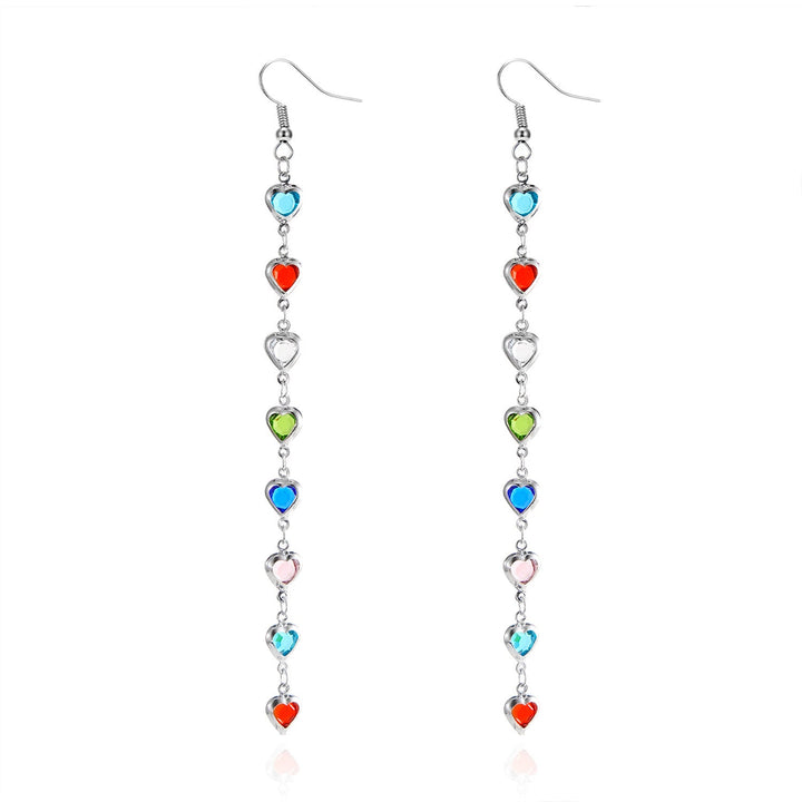 Pair of women's heart-shaped statement earrings. Dazzling white drop fashion jewelry, elegant gift for her.