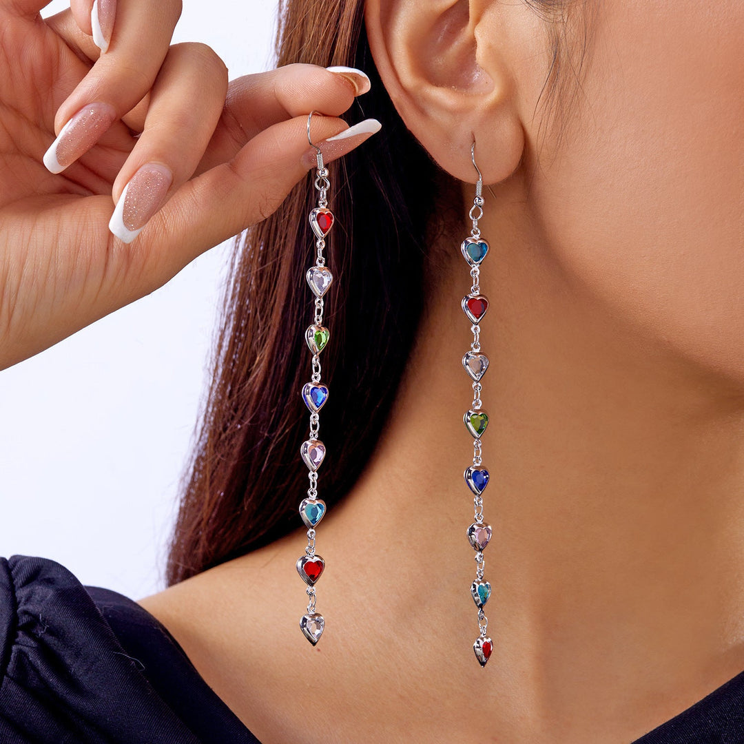 Stunning heart-shaped drop earrings for women. Dazzling white sparkle, elegant fashion jewelry for any occasion.