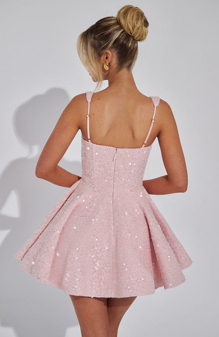 Vibrant pink sequin bow mini dress, a dazzling statement for women's party fashion & special events.