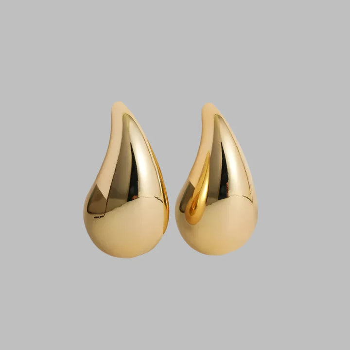 Dazzling women's crystal drop earrings. Elegant gold/silver fashion jewelry for bridal or special occasions.