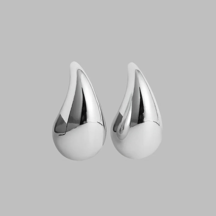 Elegant women's dangle crystal earrings. Stylish fashion accessory & bridal gift for her. Dazzling design.