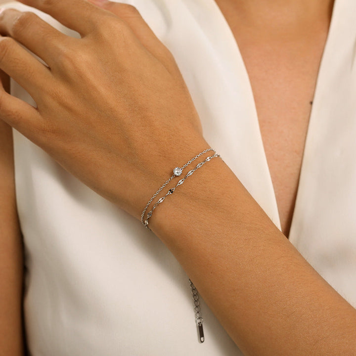 Dazzling women's double strand gold anklet, delicate foot jewelry perfect for summer elegance.