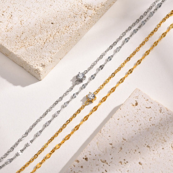 Delicate dazzling double strand gold anklet, women's elegant foot jewelry, adjustable for perfect fit.