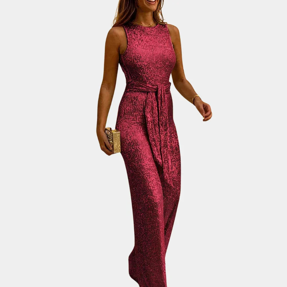 Women's dazzling glitter jumpsuit. Elegant sleeveless V-neck, perfect for glamorous party & evening wear.