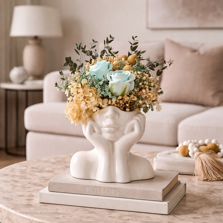 Artistic ceramic face vase, a modern decorative sculpture and unique gift for contemporary home interiors.