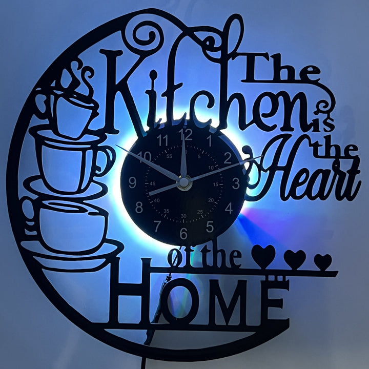 LED Kitchen Wall Clock, creating a warm atmosphere. A stylish piece of kitchen art & home accessory.