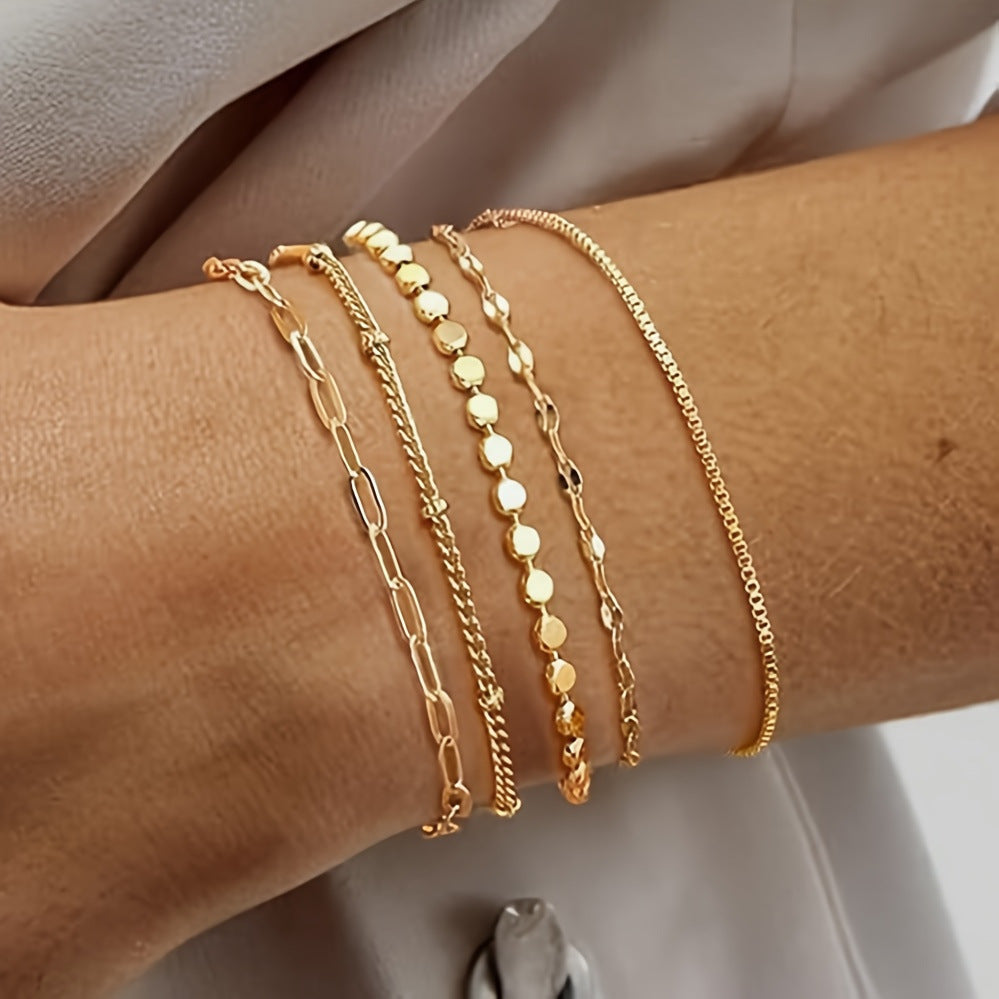 Delicate gold chain bracelet set for women. Perfect elegant jewelry & fashion accessory.