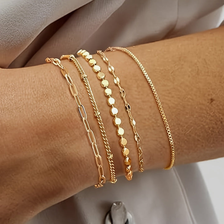 Delicate gold chain bracelet set for women. Perfect elegant jewelry & fashion accessory.